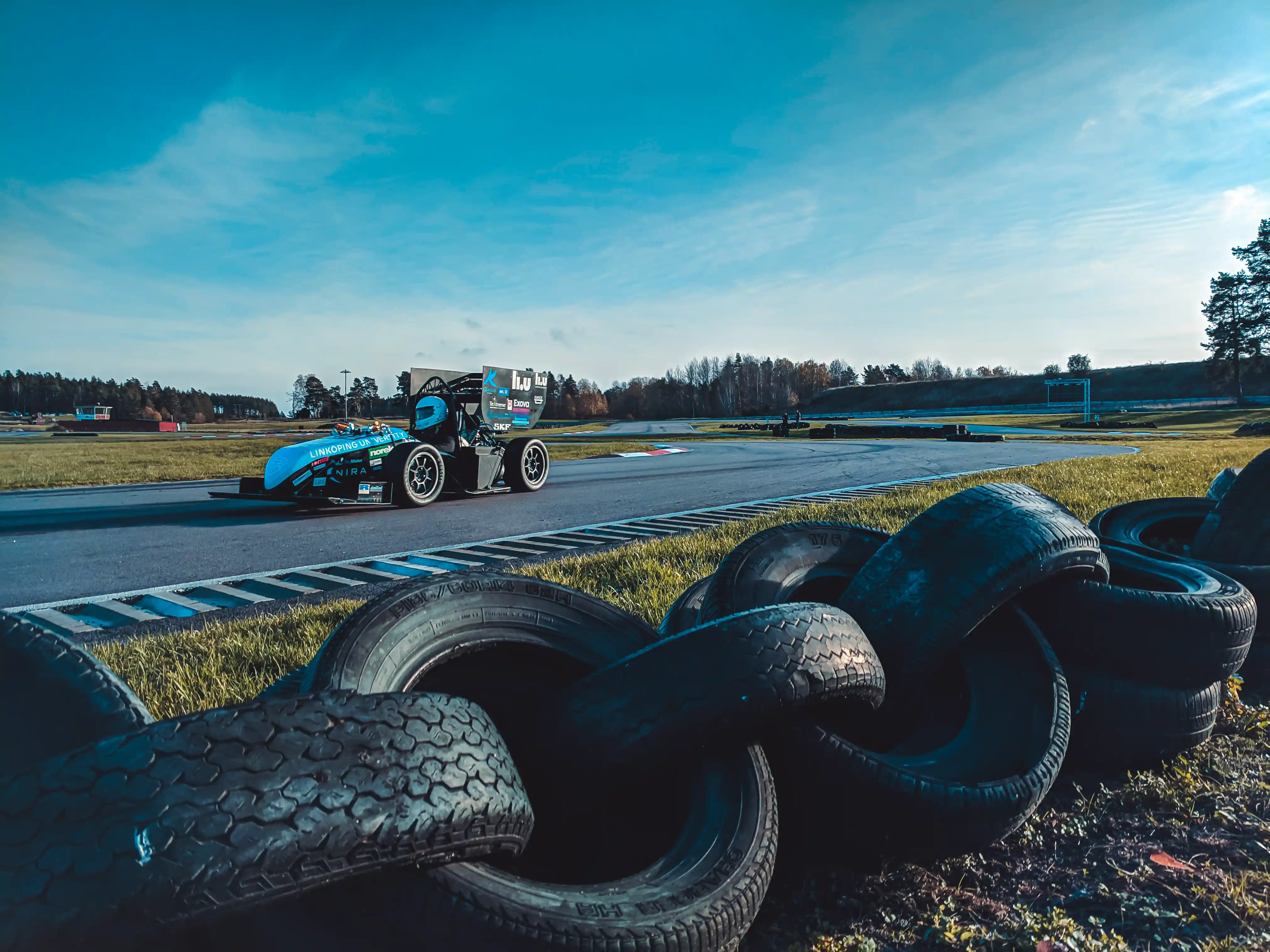 LiU Formula Student car on track at sunset