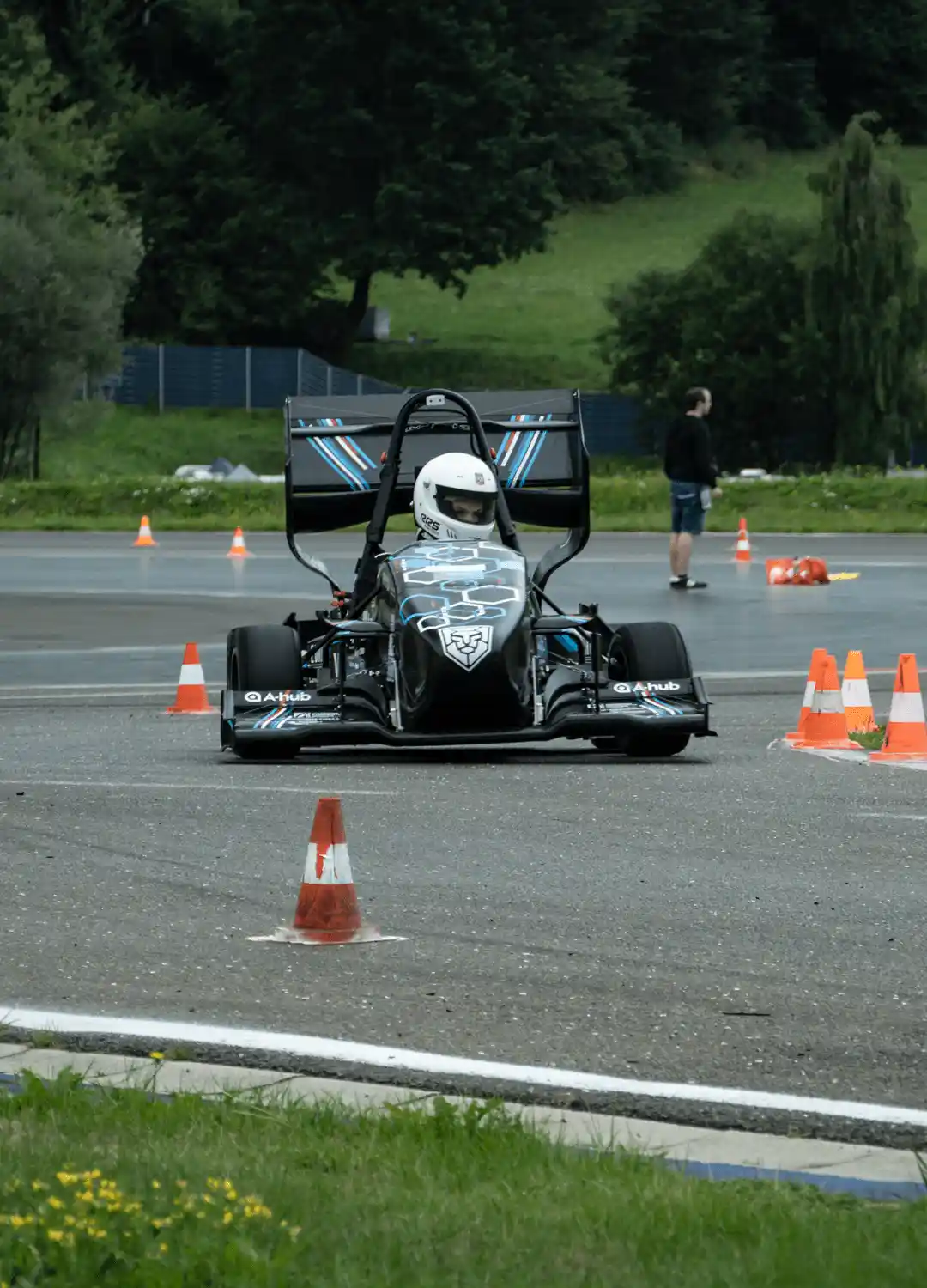 LiU Formula Student driver steering the car on track